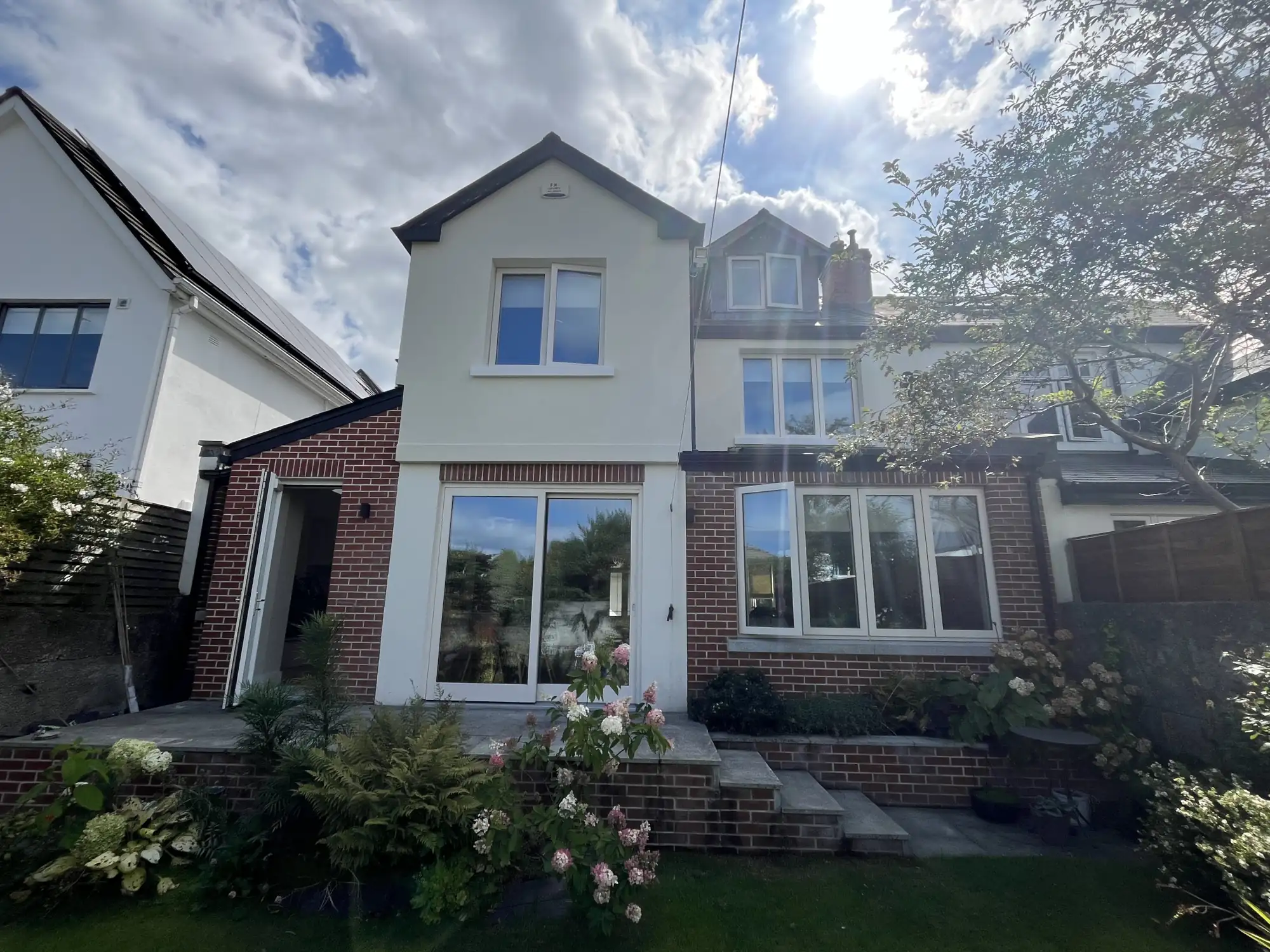 1950s House in Rathfarnham Acrylic finish with slip bricks and beautiful Arch